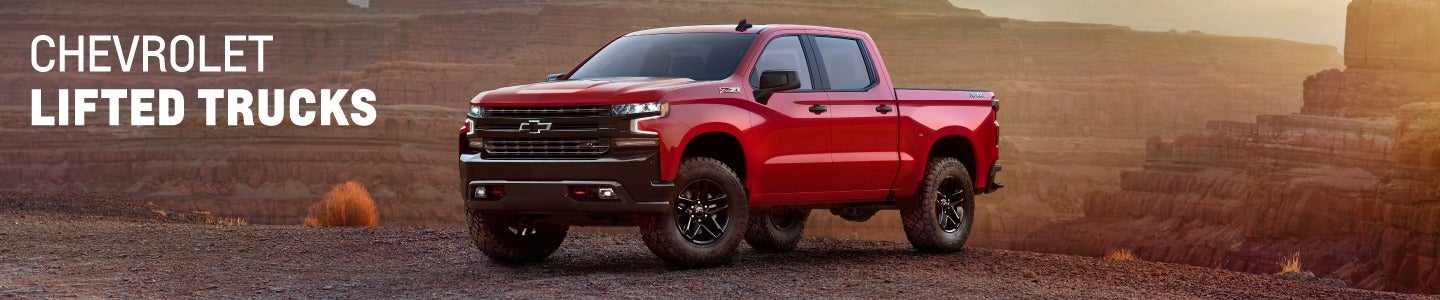 image of a red Ford lifted truck
